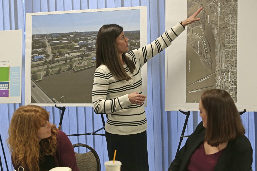 Bonnie Roy points to a view of the Quincy riverfront during a Quincy Riverfront Master Planning meeting